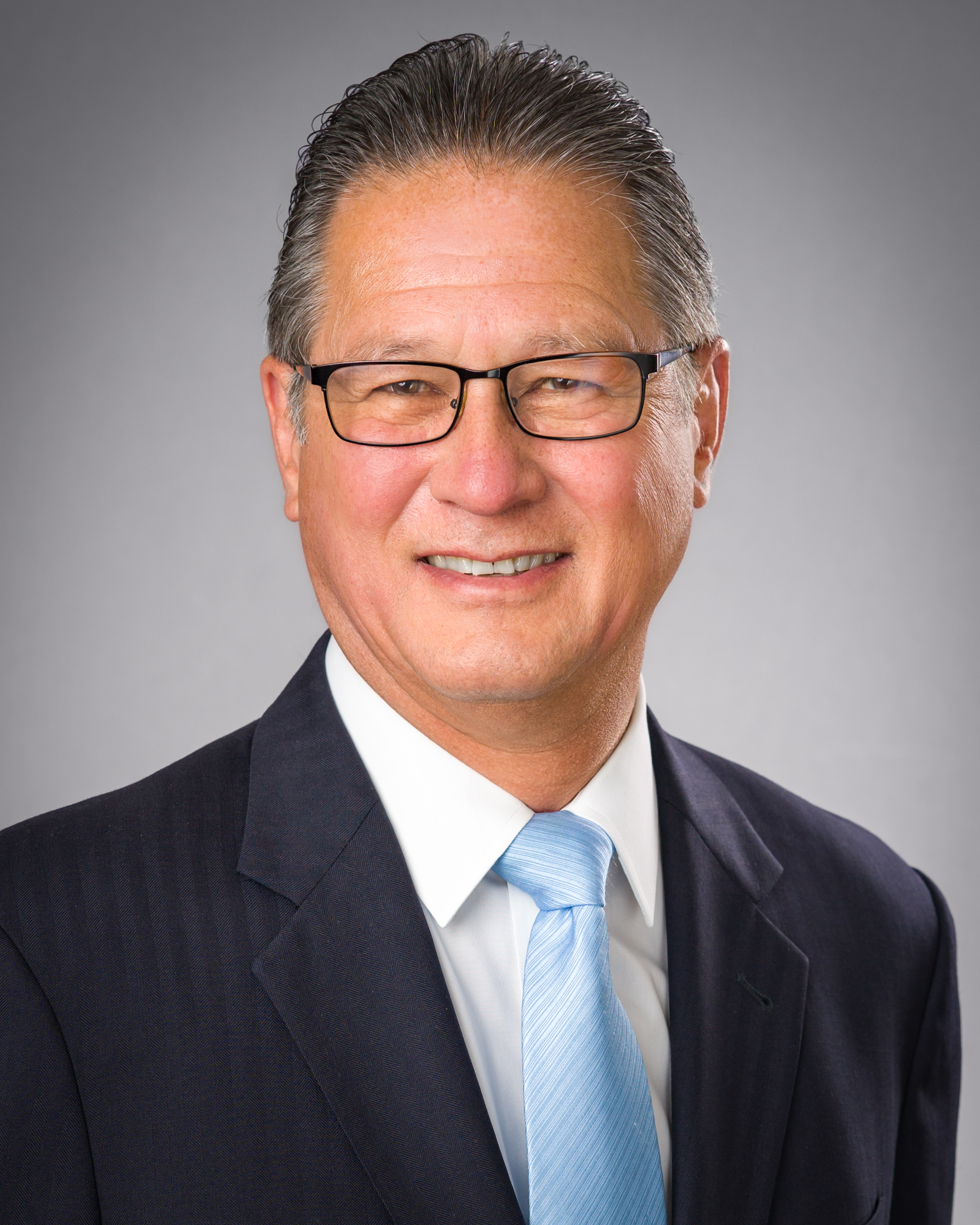 John W. Simek